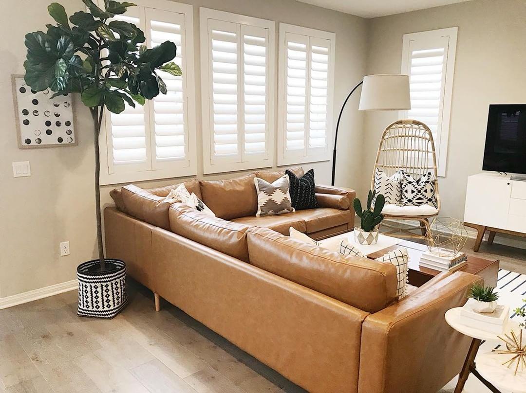 Warm living room with Polywood shutters in Honolulu.